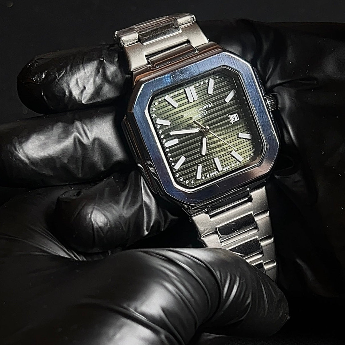 Patek Philippe Cubitus with green dial with date