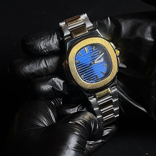 Patek Philippe Geneve twotone with blue dial with date